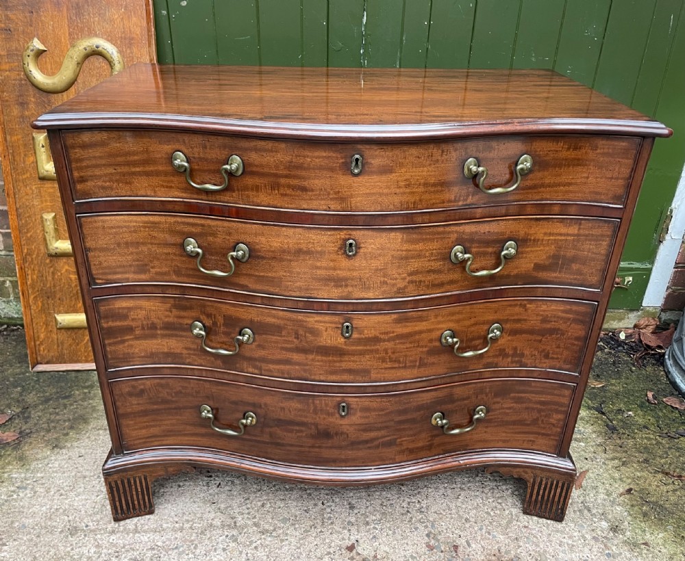 Fine C18th George III Chippendale period mahogany serpentine-front chest of drawers.  View X