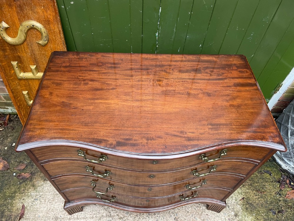 Fine C18th George III Chippendale period mahogany serpentine-front chest of drawers.  View XIII