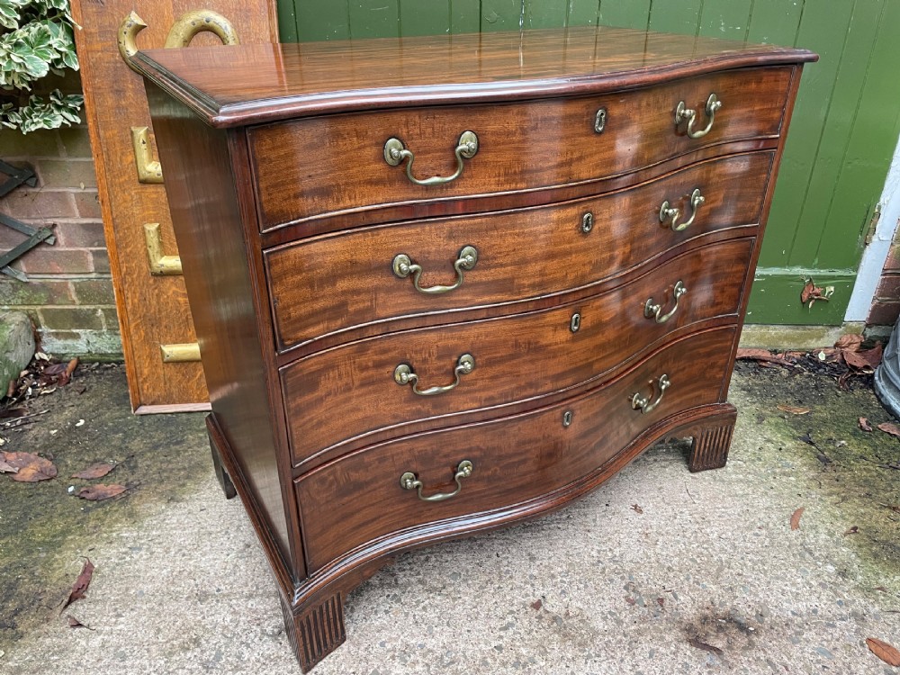 Fine C18th George III Chippendale period mahogany serpentine-front chest of drawers.  View XV