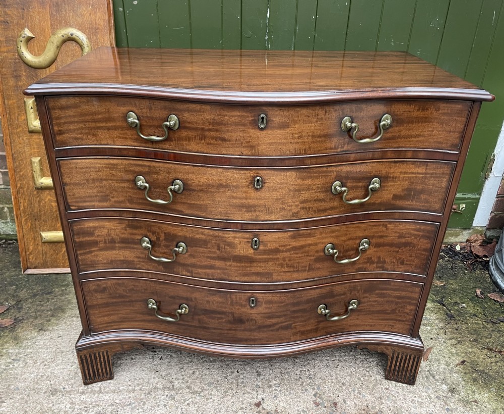 Fine C18th George III Chippendale period mahogany serpentine-front chest of drawers.  View XXX