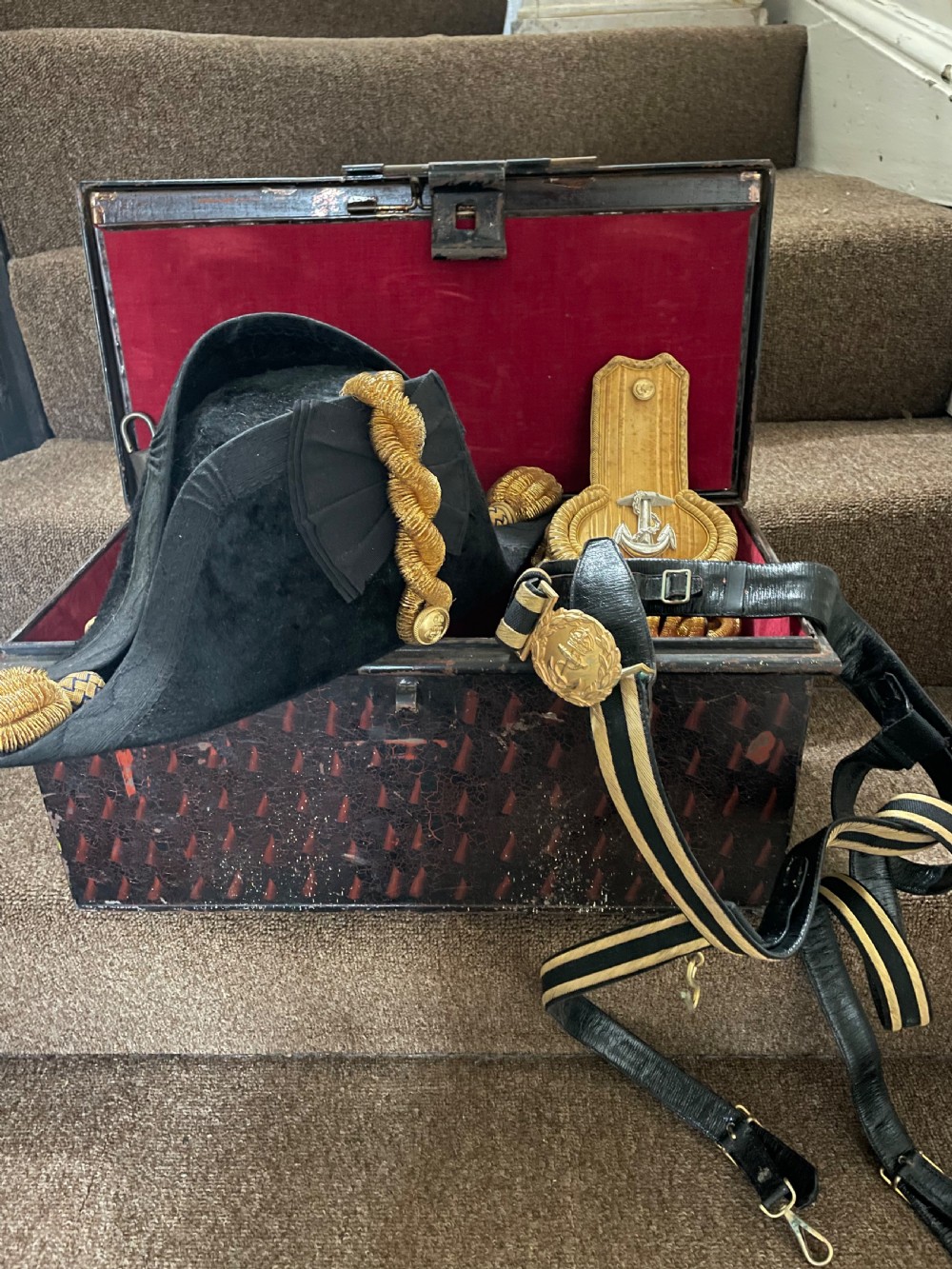 Early C20th British Royal Naval officer’s ceremonial dress bicorn hat , gold braided epaulettes and sword belt by Gieves, London. View II