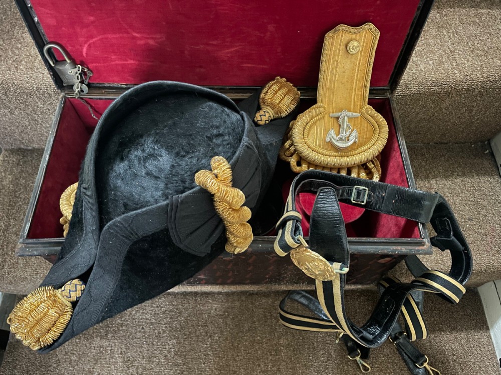 Early C20th British Royal Naval officer’s ceremonial dress bicorn hat , gold braided epaulettes and sword belt by Gieves, London. View III
