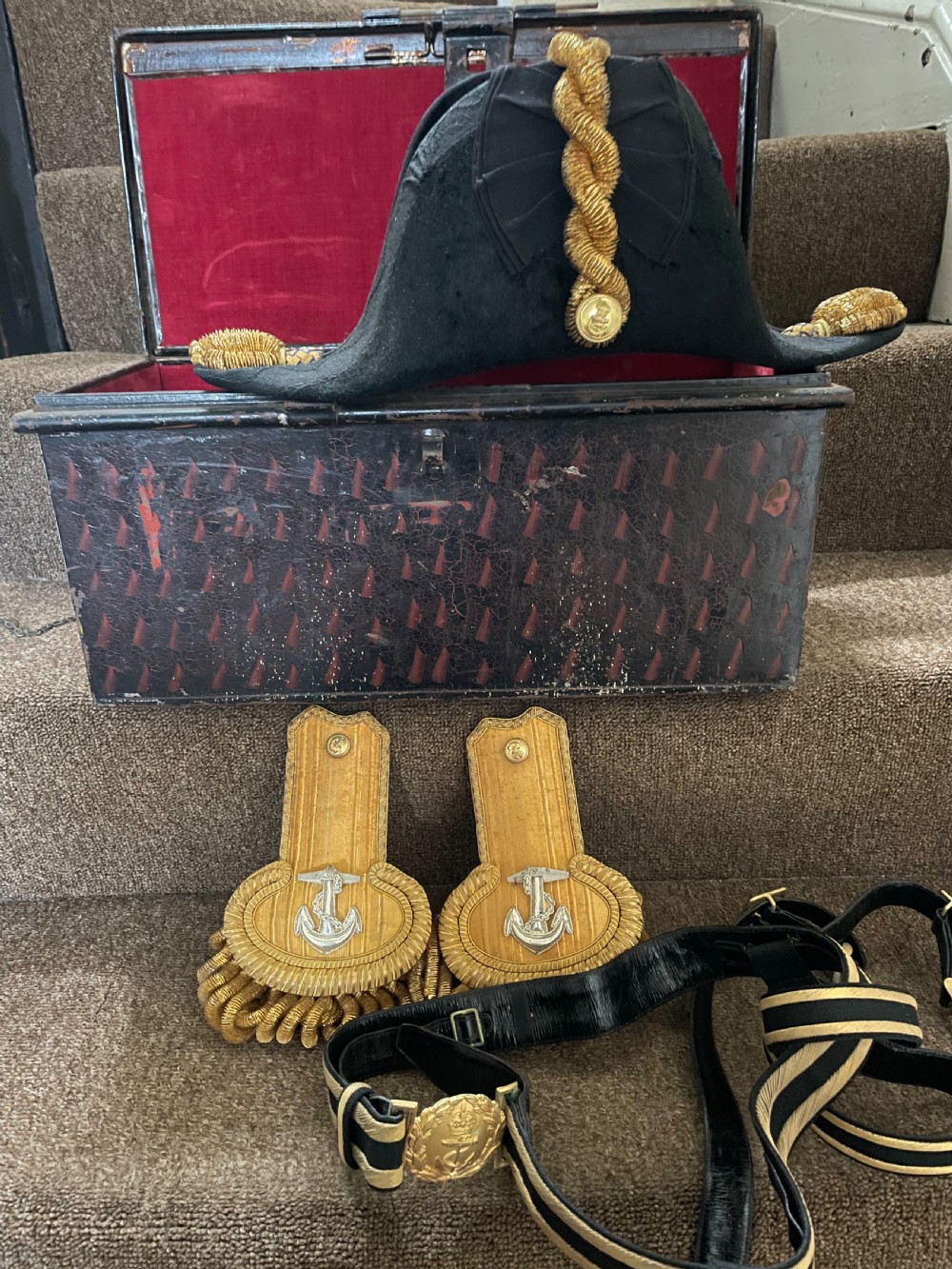 Early C20th British Royal Naval officer’s ceremonial dress bicorn hat , gold braided epaulettes and sword belt by Gieves, London. View VI