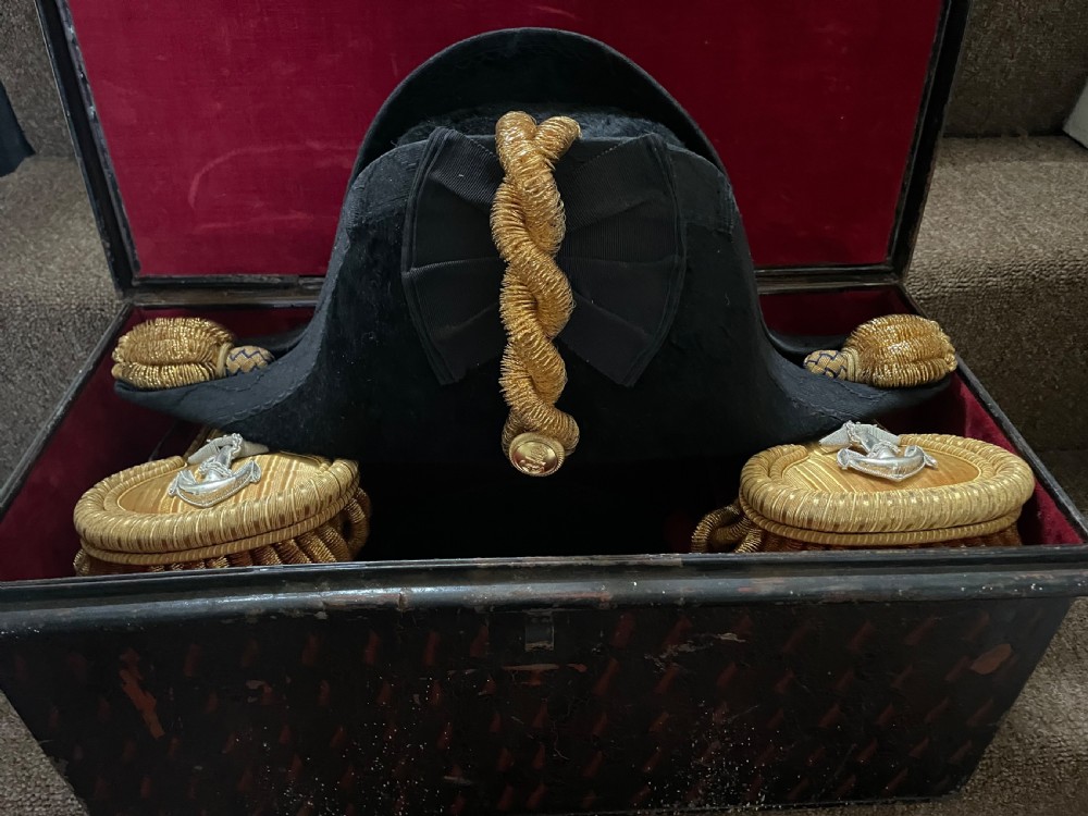 Early C20th British Royal Naval officer’s ceremonial dress bicorn hat , gold braided epaulettes and sword belt by Gieves, London. View VII