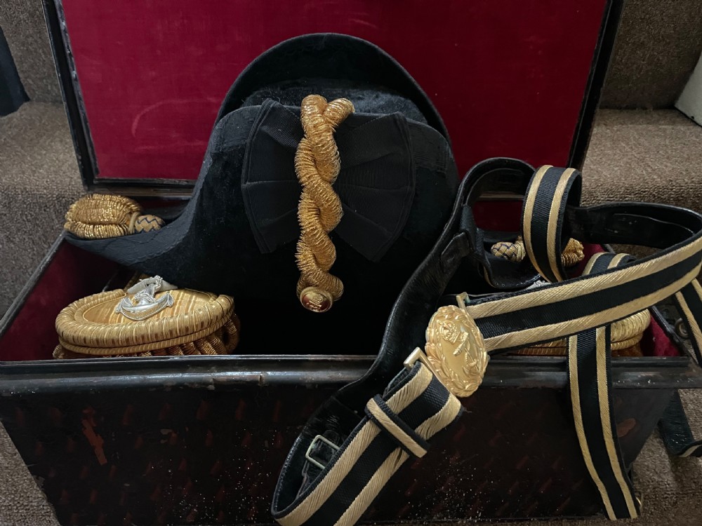 Early C20th British Royal Naval officer’s ceremonial dress bicorn hat , gold braided epaulettes and sword belt by Gieves, London. View VIII