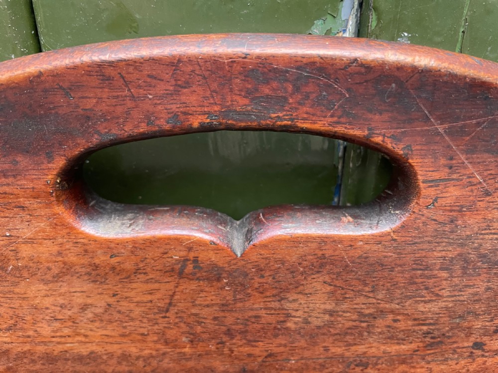 Late C18th George III period mahogany oval ‘butler’s’ tray with brass hinged folding sides . View XI