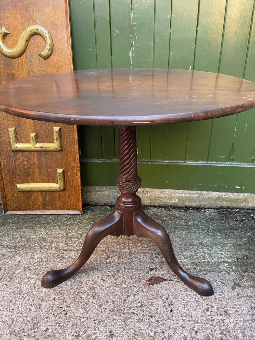 C18th George III period mahogany circular ‘snap-top’ tripod base tea table on carved pillar column.  View III
