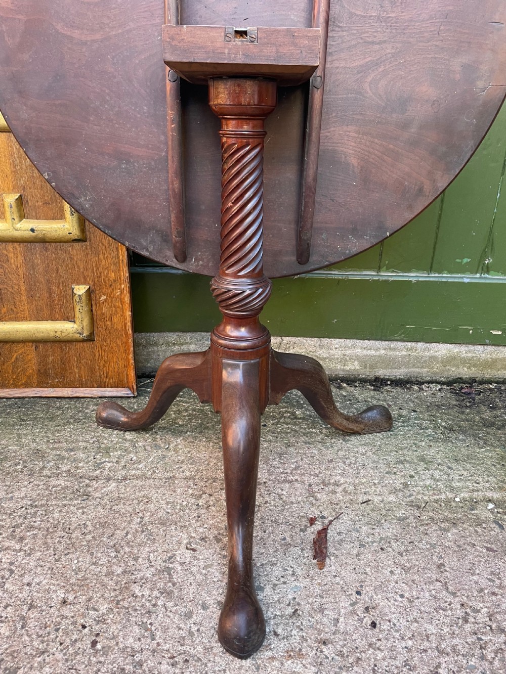 C18th George III period mahogany circular ‘snap-top’ tripod base tea table on carved pillar column.  View V