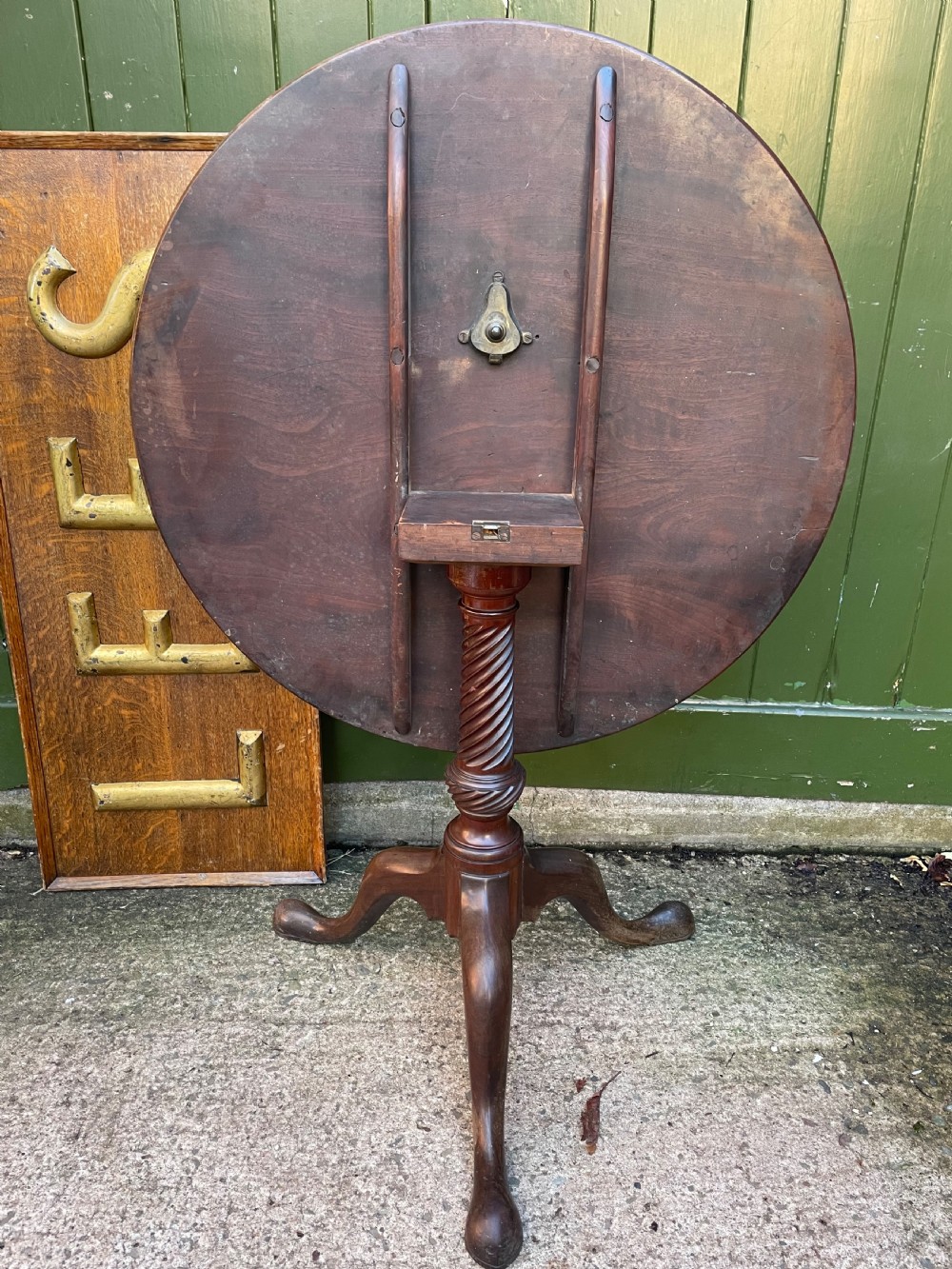 C18th George III period mahogany circular ‘snap-top’ tripod base tea table on carved pillar column.  View IX