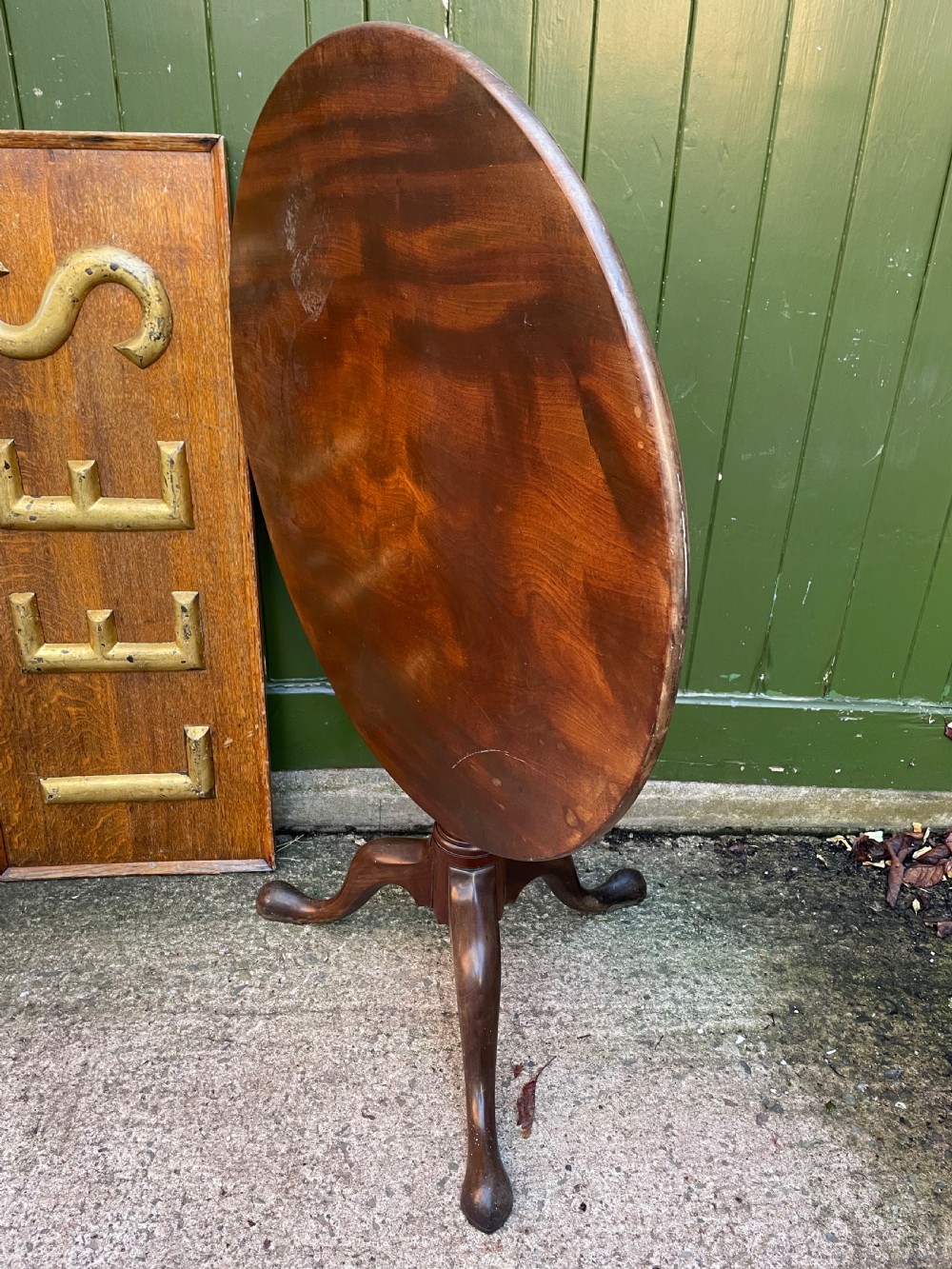 C18th George III period mahogany circular ‘snap-top’ tripod base tea table on carved pillar column.  View XIII