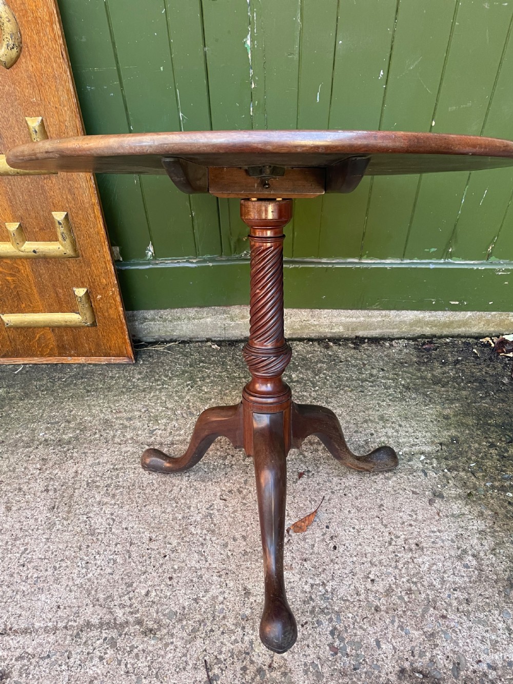 C18th George III period mahogany circular ‘snap-top’ tripod base tea table on carved pillar column.  View XVII