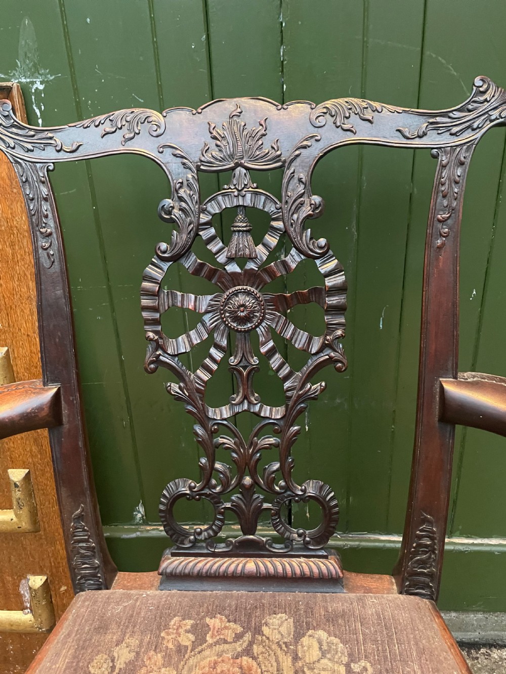 A late 19th-century carved mahogany armchair featuring carved eagle-head armrests, a pierced ribbon splat back, floral tapestry upholstery, and cabriole legs with claw-and-ball feet. View III