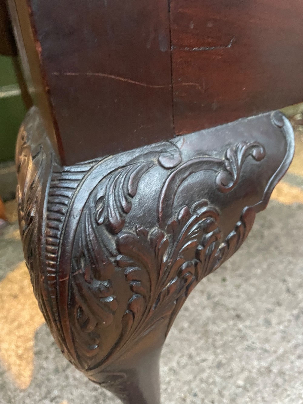 A late 19th-century carved mahogany armchair featuring carved eagle-head armrests, a pierced ribbon splat back, floral tapestry upholstery, and cabriole legs with claw-and-ball feet. View VII