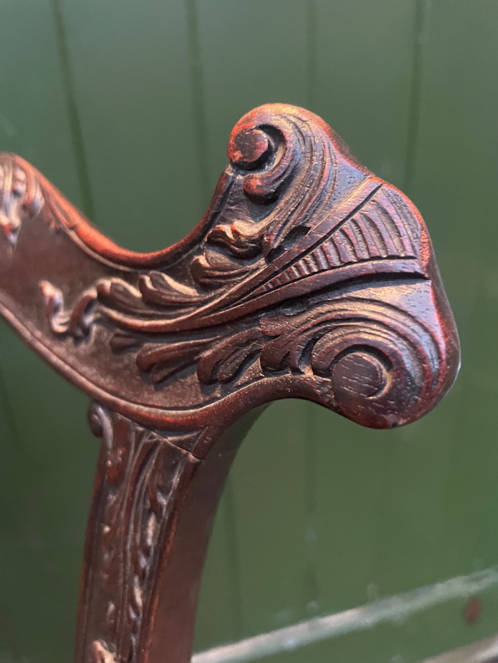 A late 19th-century carved mahogany armchair featuring carved eagle-head armrests, a pierced ribbon splat back, floral tapestry upholstery, and cabriole legs with claw-and-ball feet. View IX