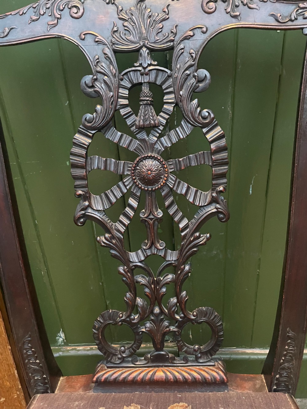 A late 19th-century carved mahogany armchair featuring carved eagle-head armrests, a pierced ribbon splat back, floral tapestry upholstery, and cabriole legs with claw-and-ball feet. View XIII