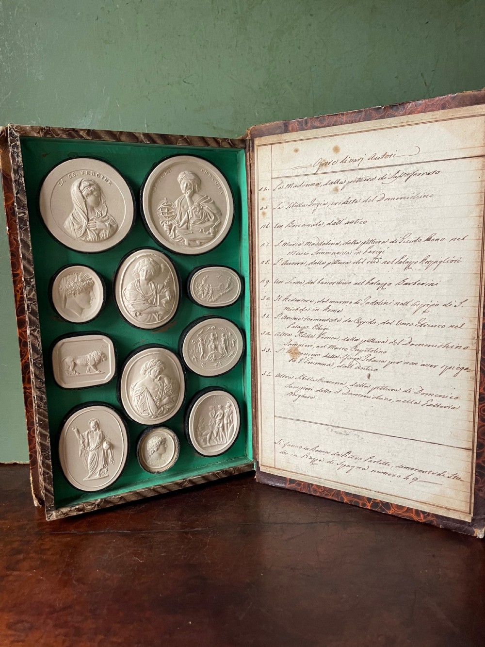 Mid C19th Italian ‘Grand Tour’ souvenir double-sided faux book containing a selection of various plaster intaglios by Paoletti. View III