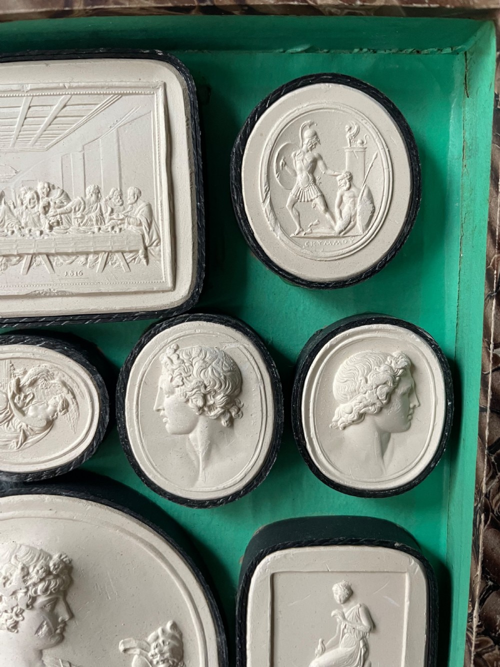 Mid C19th Italian ‘Grand Tour’ souvenir double-sided faux book containing a selection of various plaster intaglios by Paoletti. View V