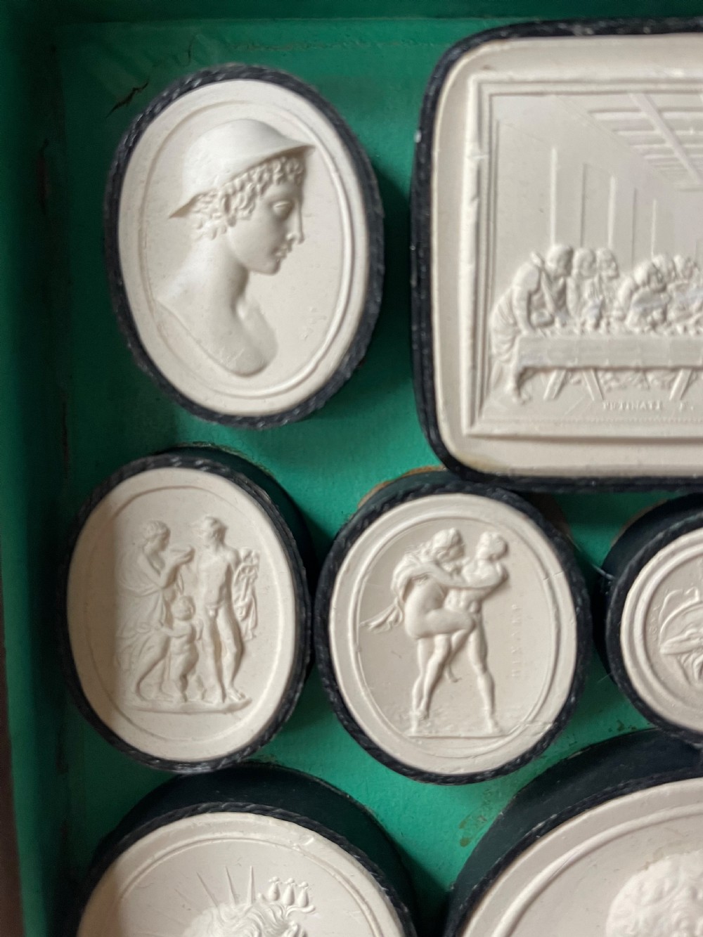 Mid C19th Italian ‘Grand Tour’ souvenir double-sided faux book containing a selection of various plaster intaglios by Paoletti. View VI
