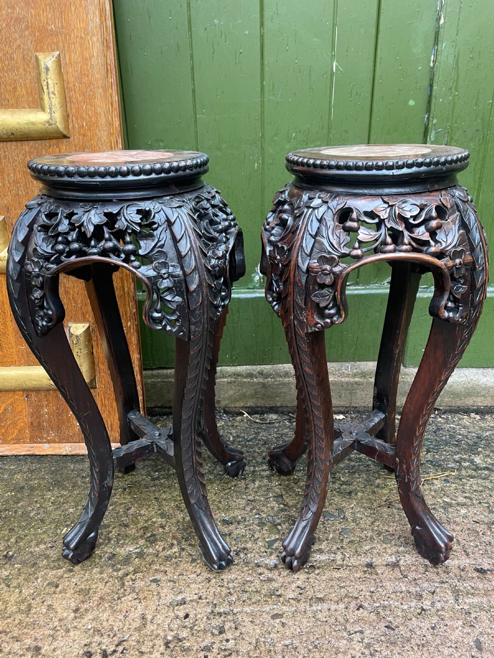 Pair of late C19th/early C20th Chinese Qing Dynasty carved hardwood vases stands .