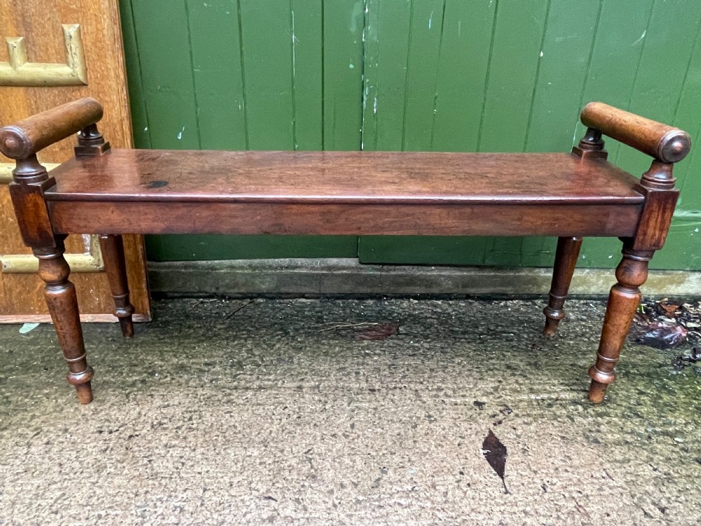 Early C19th Regency period mahogany hall bench or seat with cylindrical roll-end supports. View VI