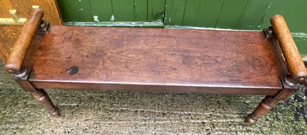 Early C19th Regency period mahogany hall bench or seat with cylindrical roll-end supports. View VII
