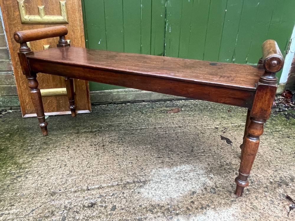 Early C19th Regency period mahogany hall bench or seat with cylindrical roll-end supports. View X