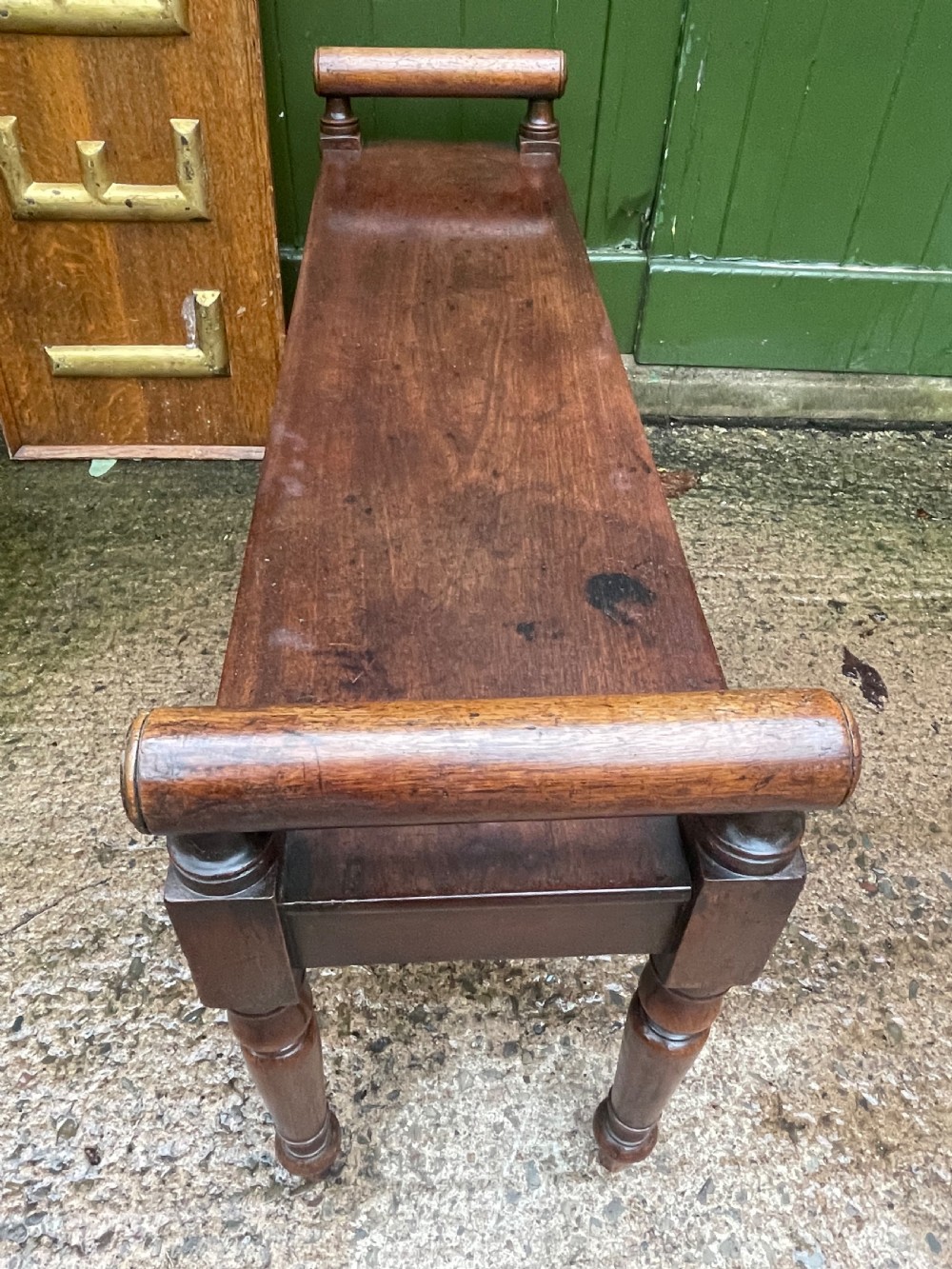 Early C19th Regency period mahogany hall bench or seat with cylindrical roll-end supports. View XIV