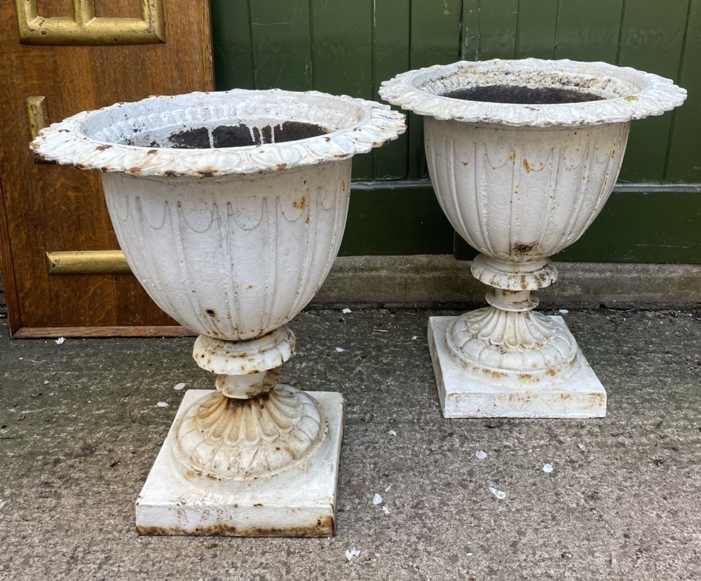 Pair of mid C19th cast-iron garden or terrace vases . View V