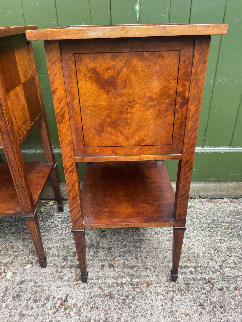 Pair of elegant late C19th figured walnut or satin birch bedside tables or nightstands.  View IV