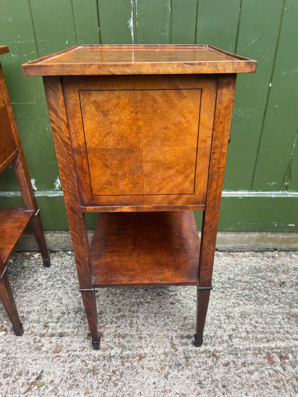 Pair of elegant late C19th figured walnut or satin birch bedside tables or nightstands.  View V