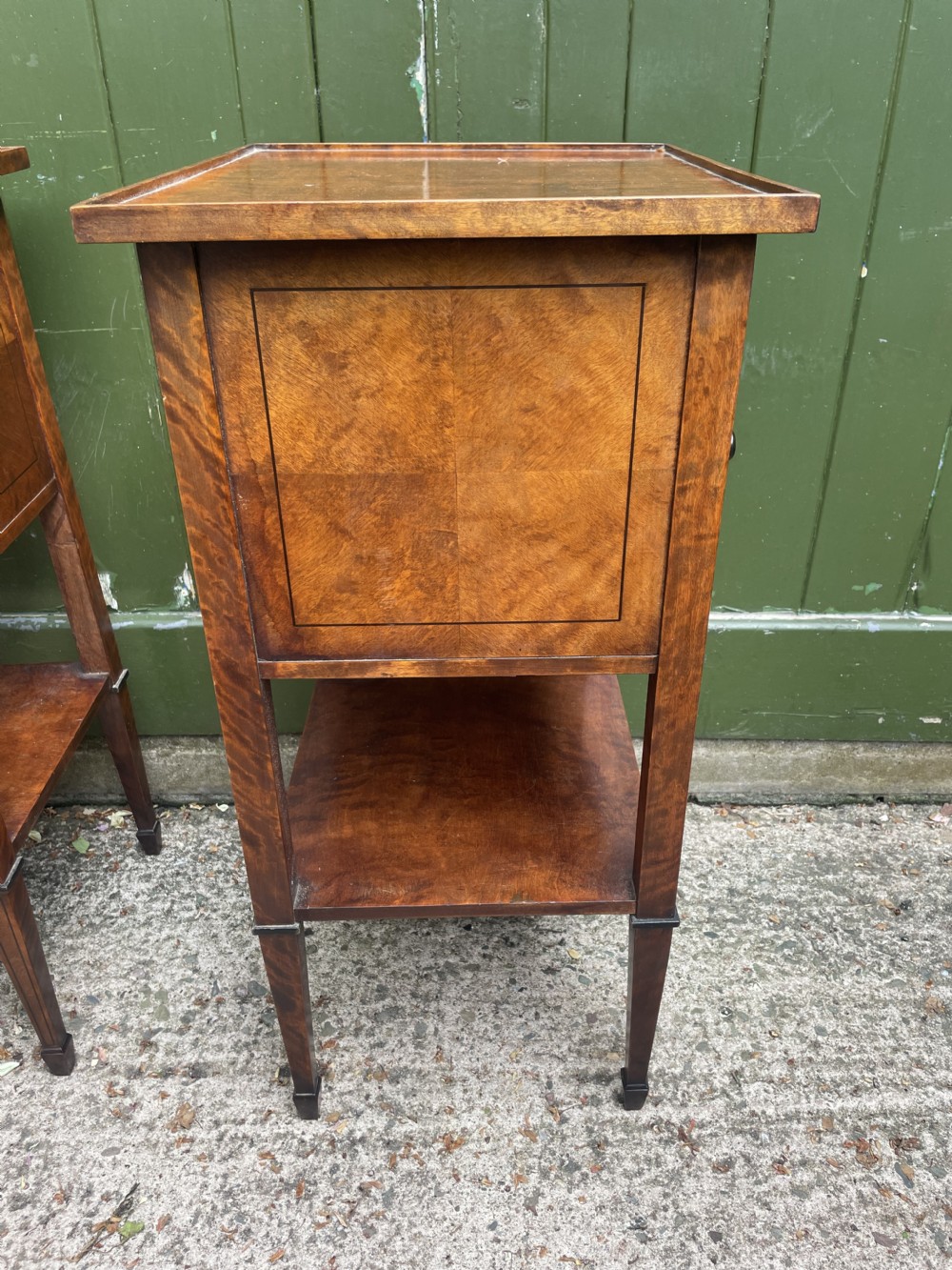 Pair of elegant late C19th figured walnut or satin birch bedside tables or nightstands.  View XVII