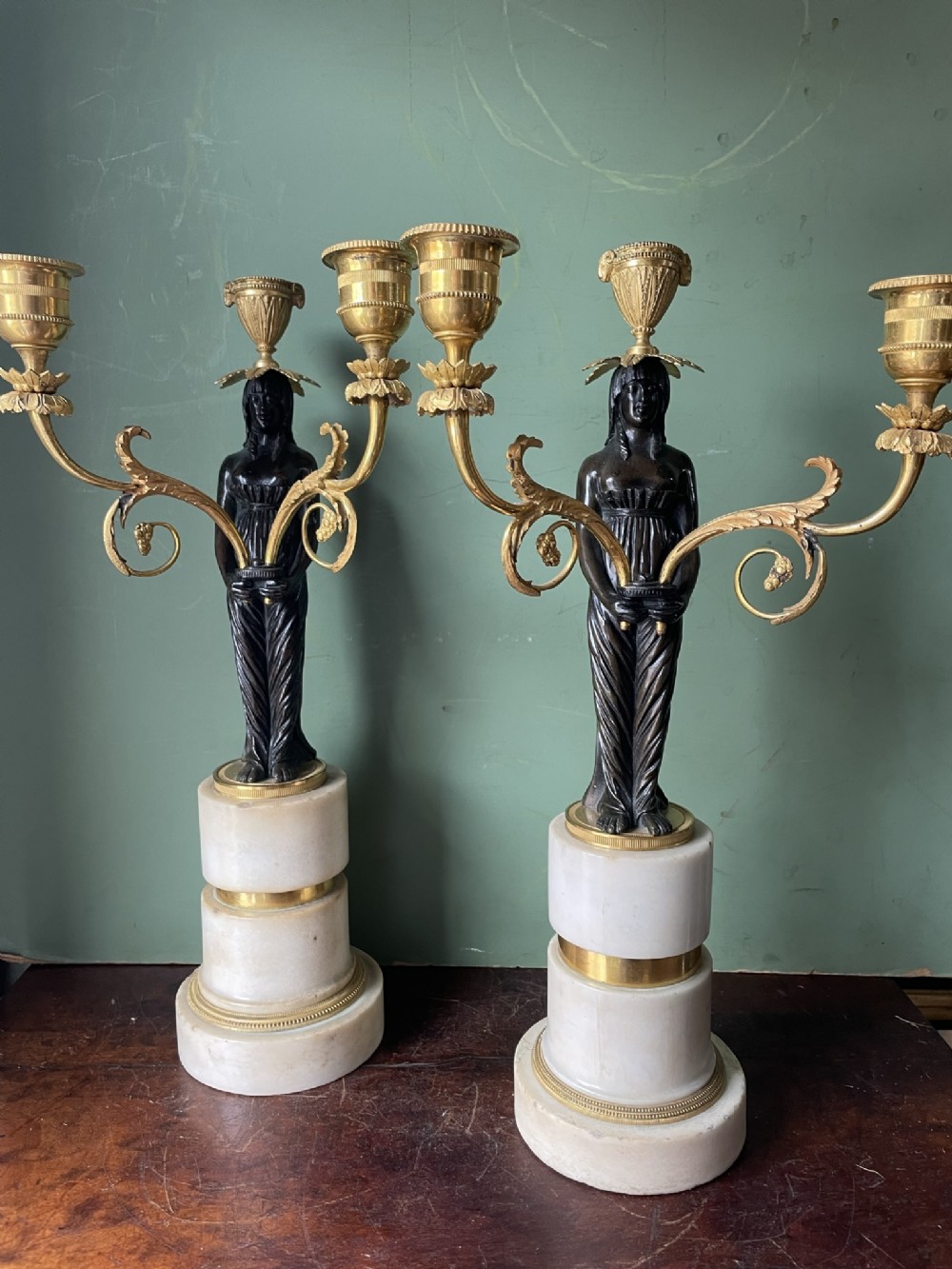 Fine quality pair of early C19th Empire style bronze and ormolu bronze candelabras .