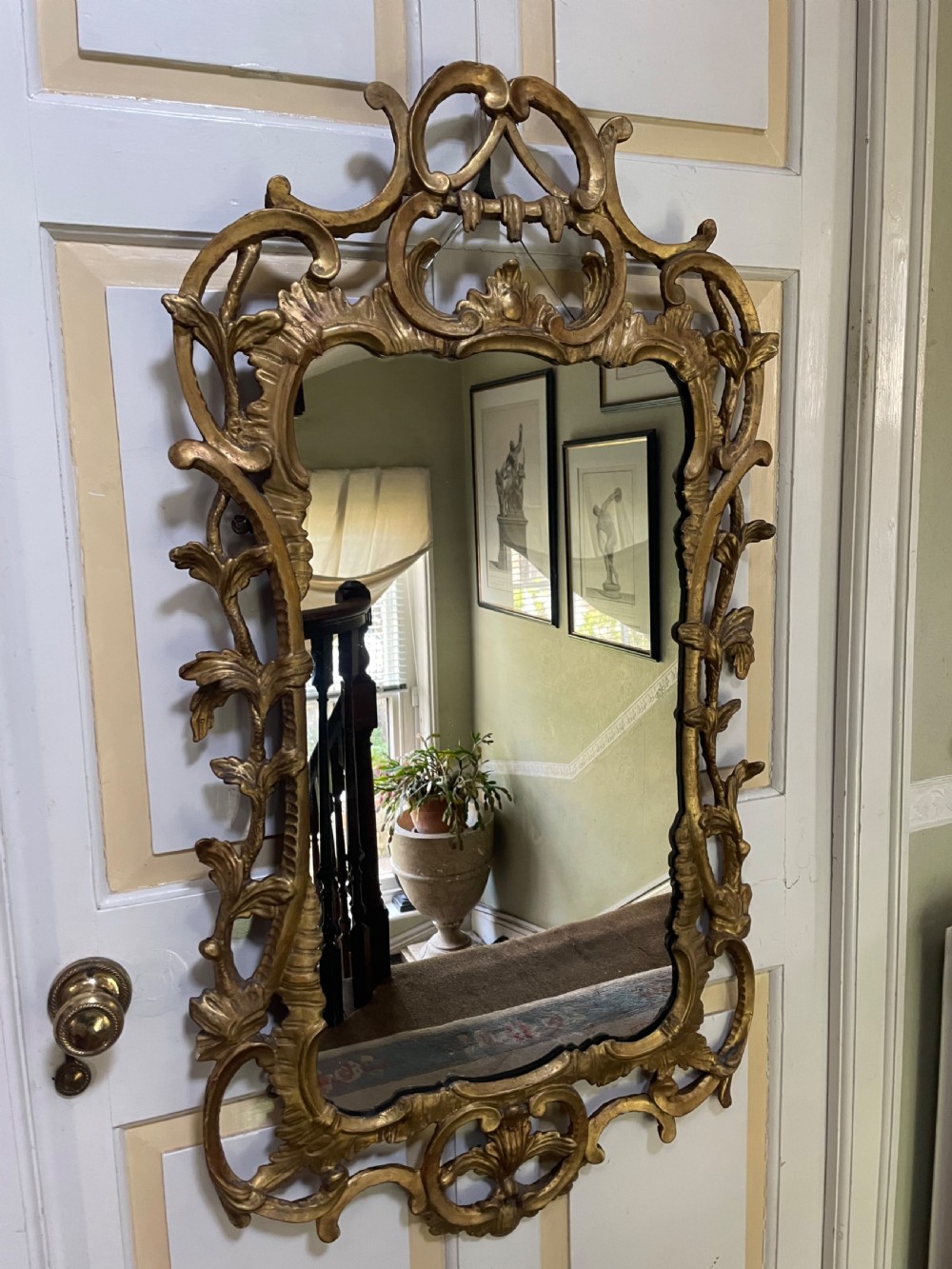 C18th George III Chippendale period carved gilt-wood frame rococo-style wall mirror. View III