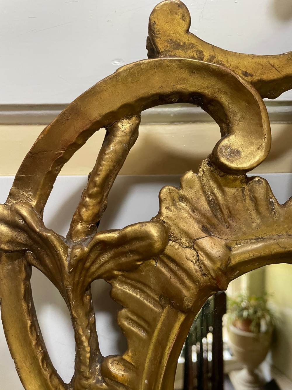 C18th George III Chippendale period carved gilt-wood frame rococo-style wall mirror. View V