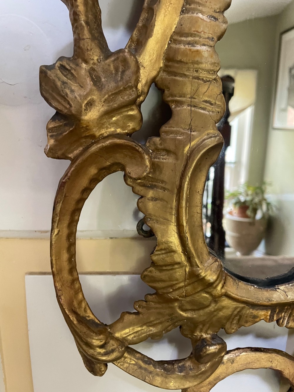 C18th George III Chippendale period carved gilt-wood frame rococo-style wall mirror. View VII