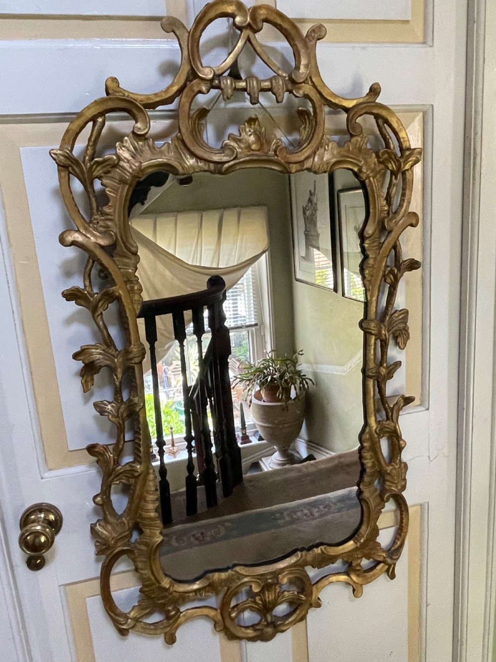 C18th George III Chippendale period carved gilt-wood frame rococo-style wall mirror. View XXIV