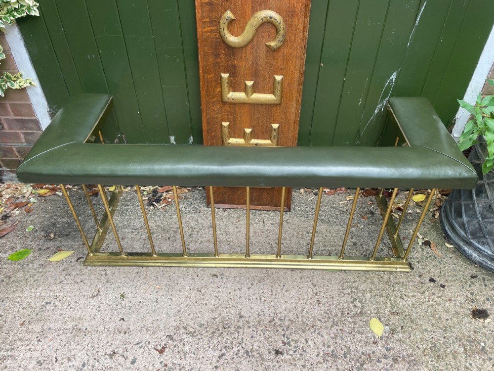 Early C20th Edwardian period polished brass and leather seated ‘club’ fender of restrained design. View IV