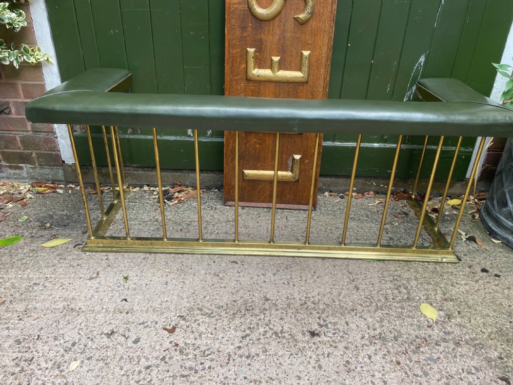 Early C20th Edwardian period polished brass and leather seated ‘club’ fender of restrained design. View VIII