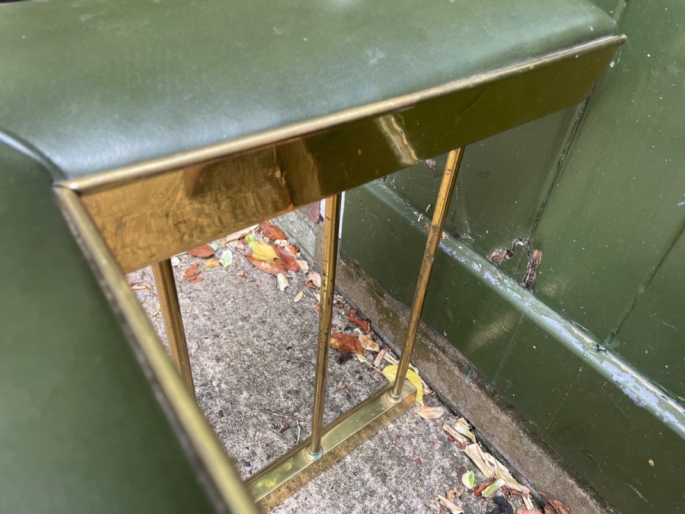 Early C20th Edwardian period polished brass and leather seated ‘club’ fender of restrained design. View XI
