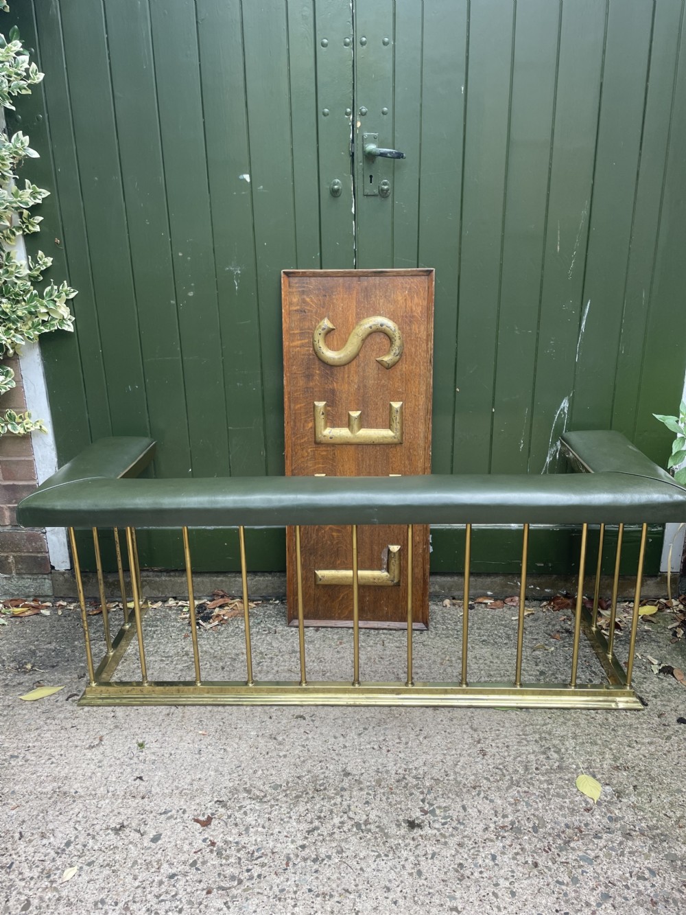 Early C20th Edwardian period polished brass and leather seated ‘club’ fender of restrained design. View XIII