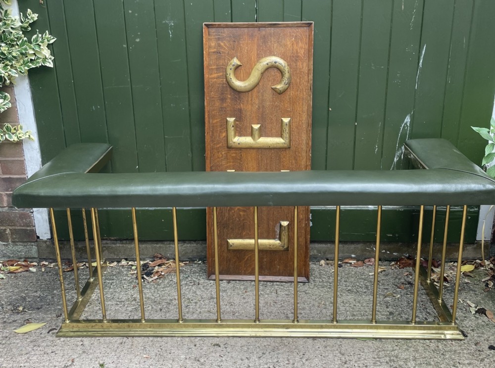 Early C20th Edwardian period polished brass and leather seated ‘club’ fender of restrained design. View IX