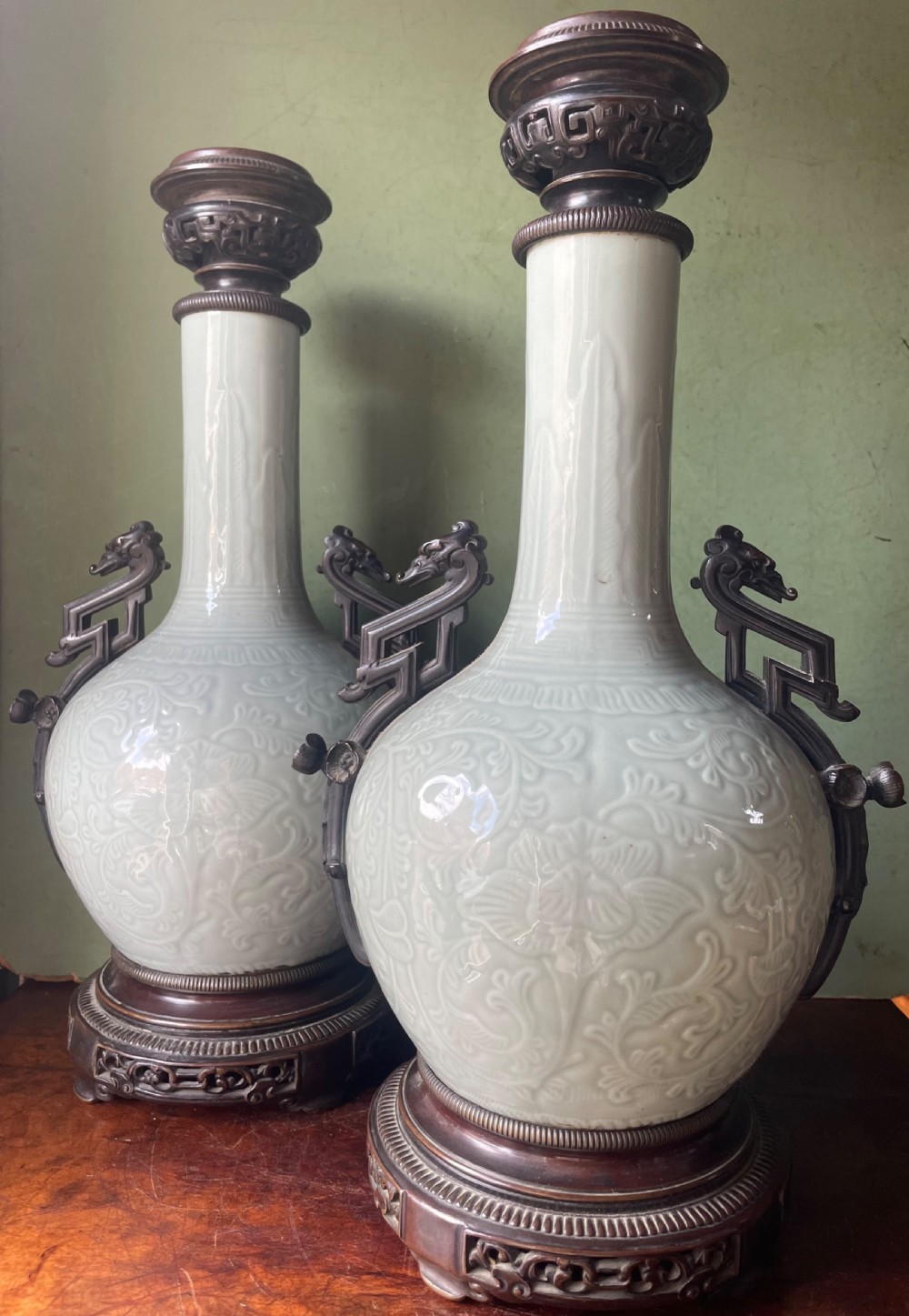 Pair of C19th French celadon porcelain Chinese style bronze-mounted lamps .