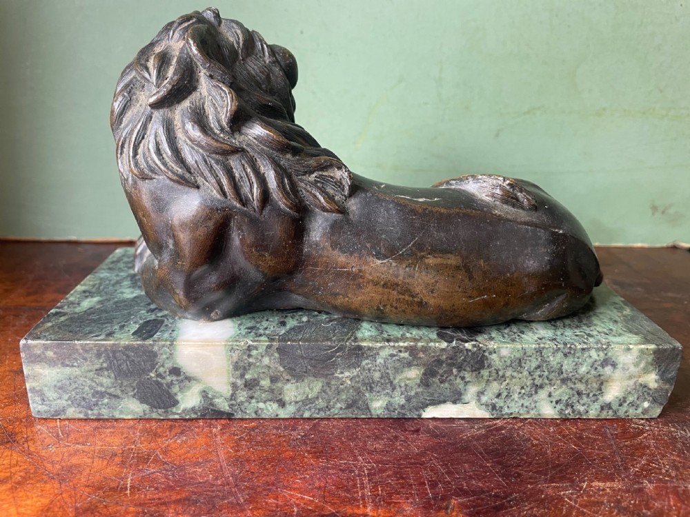 Fine pair of early C19th Regency period bronze lions mounted on ‘verde antico’ marble plinth bases. View V