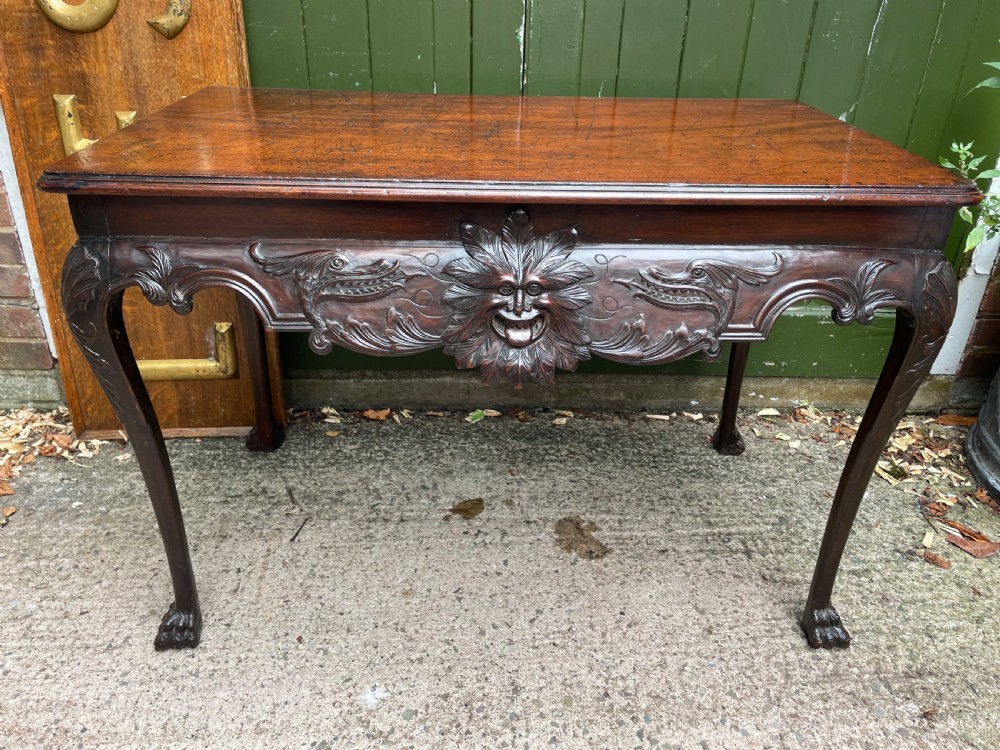 C19th Irish carved mahogany side table in the mid C18th George II period style. View II