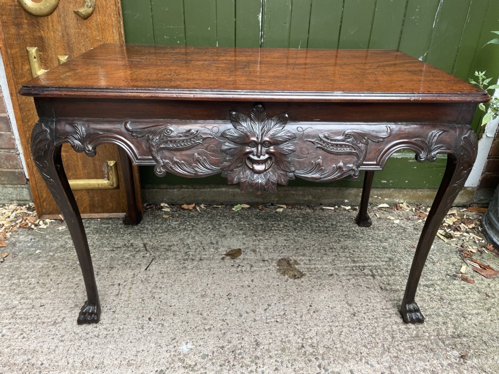C19th Irish carved mahogany side table in the mid C18th George II period style.