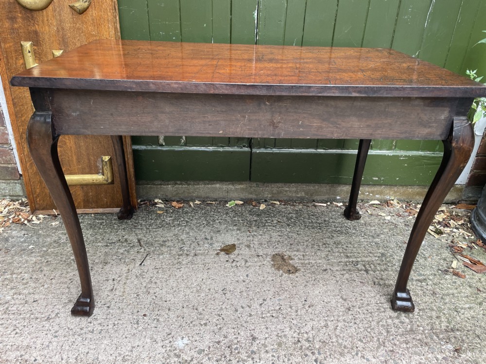 C19th Irish carved mahogany side table in the mid C18th George II period style. View XVII