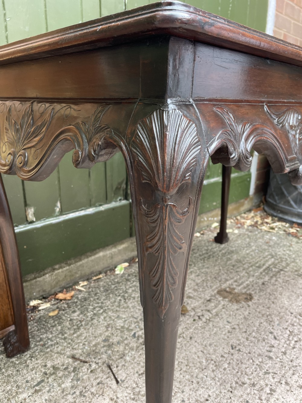 C19th Irish carved mahogany side table in the mid C18th George II period style. View XXI