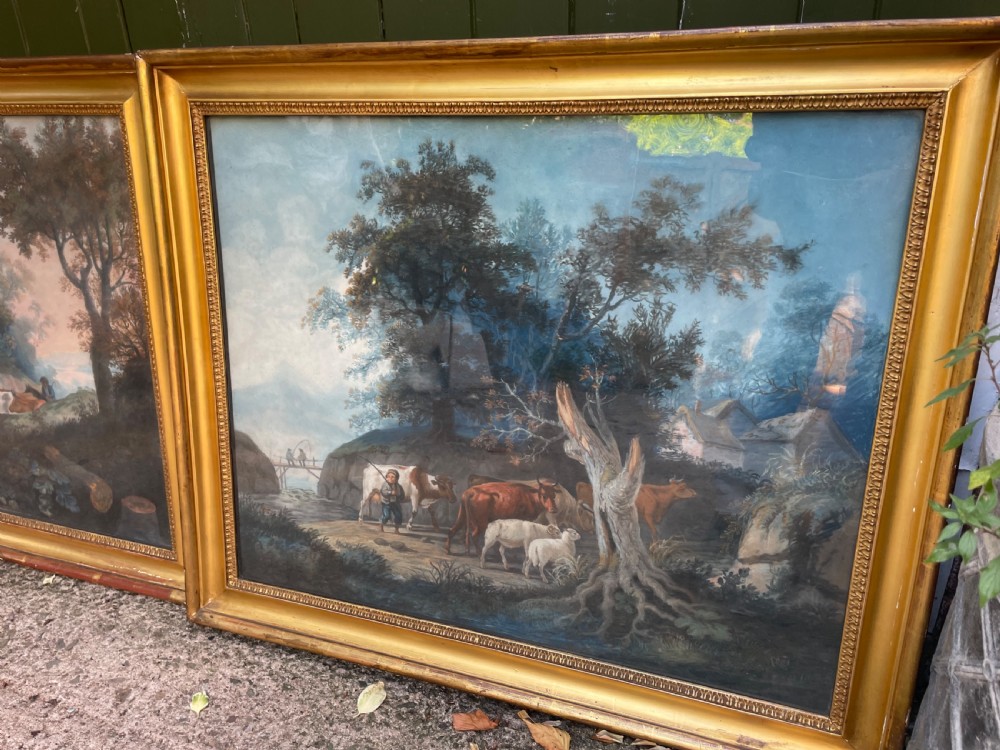 Pair of finely executed large early C19th pastel paintings depicting bucolic pastoral country landscapes in original giltwood frames in the manner of Peter Le Cave .  View VII