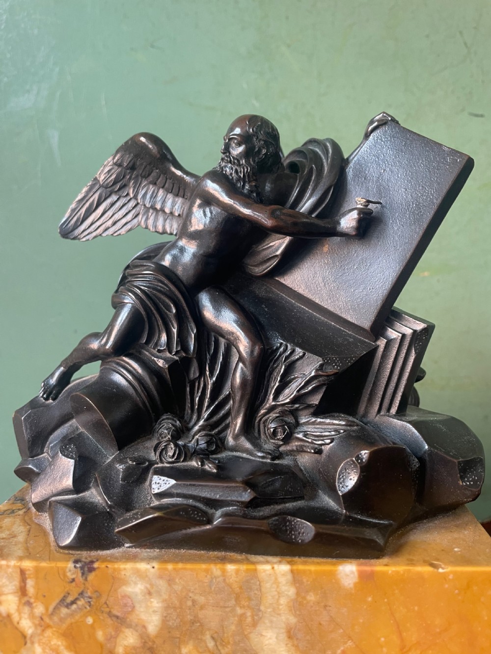 Early C19th French classical bronze study mounted on a ‘giallo di siena’ marble plinth base , probably depicting Chronos . View III