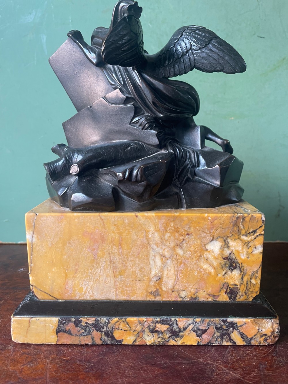 Early C19th French classical bronze study mounted on a ‘giallo di siena’ marble plinth base , probably depicting Chronos . View VII